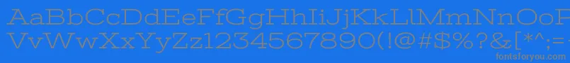 StintultraexpandedRegular Font – Gray Fonts on Blue Background