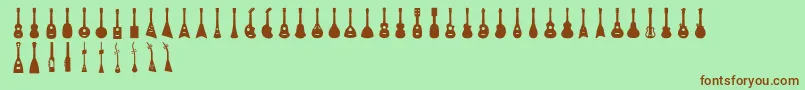 Ukulele-Schriftart – Braune Schriften auf grünem Hintergrund