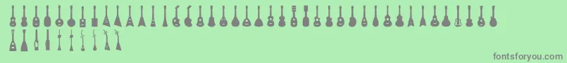 fuente Ukulele – Fuentes Grises Sobre Fondo Verde