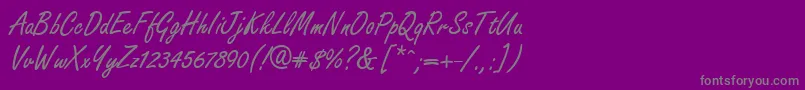 GeFreelancer-fontti – harmaat kirjasimet violetilla taustalla