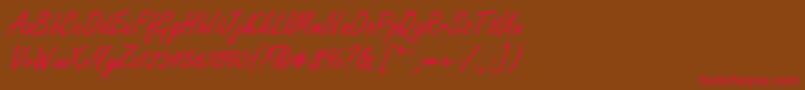 フォントGeFreelancer – 赤い文字が茶色の背景にあります。