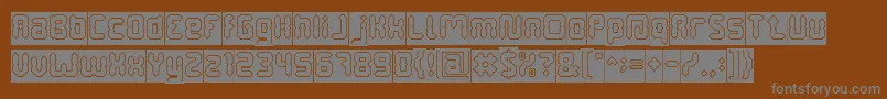 Fonte DigitalGothicHollowInverse – fontes cinzas em um fundo marrom