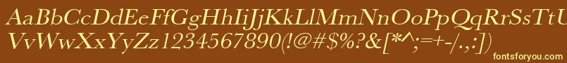 UrwbaskertwidOblique-fontti – keltaiset fontit ruskealla taustalla
