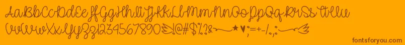 UnicornSparklesOtf Font – Brown Fonts on Orange Background