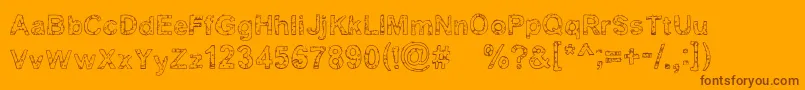 Yugly-fontti – ruskeat fontit oranssilla taustalla