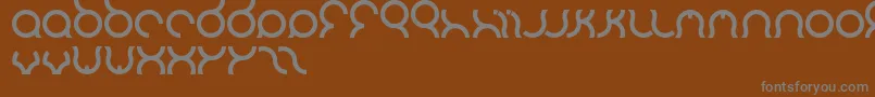 Шрифт Mozzie – серые шрифты на коричневом фоне