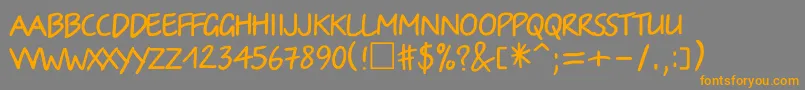 Irinactt Font – Orange Fonts on Gray Background