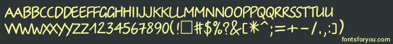 Irinactt Font – Yellow Fonts on Black Background