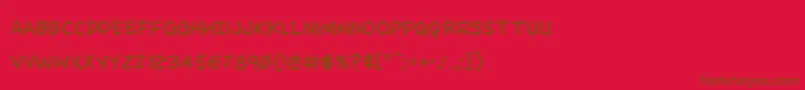 Dominomask-Schriftart – Braune Schriften auf rotem Hintergrund
