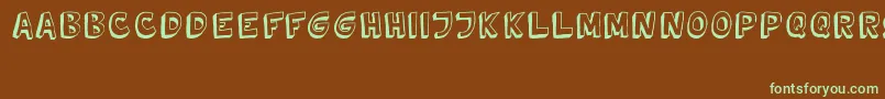 フォントTweedyVer02222010Thunderpanda – 緑色の文字が茶色の背景にあります。