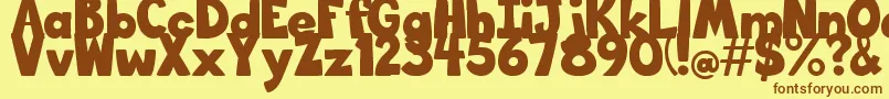 BigBottomTypefaceNormal Font – Brown Fonts on Yellow Background