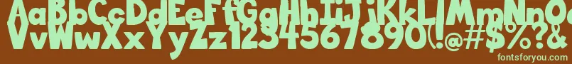 フォントBigBottomTypefaceNormal – 緑色の文字が茶色の背景にあります。