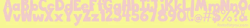 Czcionka BigBottomTypefaceNormal – różowe czcionki na żółtym tle