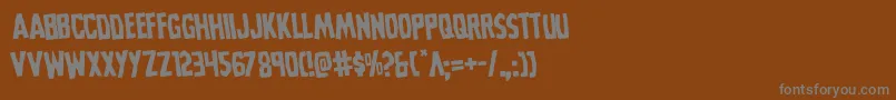 フォントGrimghostrotate – 茶色の背景に灰色の文字