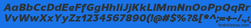 UnimanHeavyitalic Font – Black Fonts on Blue Background