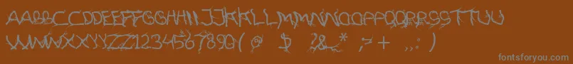 FtfHutanAkarasiana Font – Gray Fonts on Brown Background