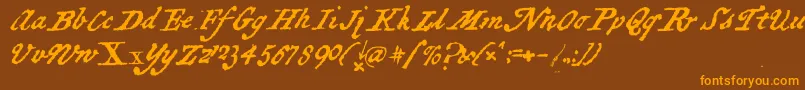 フォントBlackSamsGold – オレンジ色の文字が茶色の背景にあります。