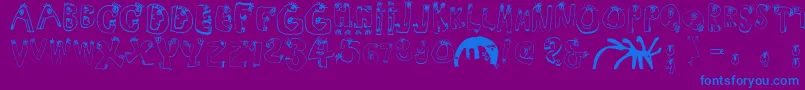 Humanabc Font – Blue Fonts on Purple Background