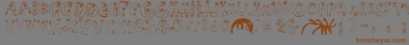 Humanabc Font – Brown Fonts on Gray Background