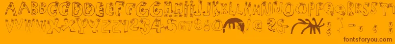 Humanabc Font – Brown Fonts on Orange Background