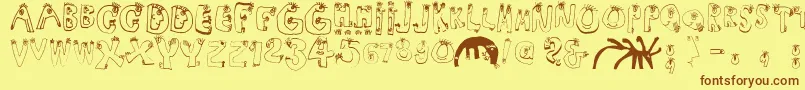 Humanabc Font – Brown Fonts on Yellow Background