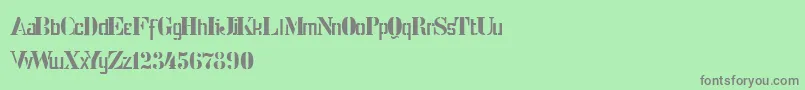 StencilIntellectaLimitedSet-fontti – harmaat kirjasimet vihreällä taustalla