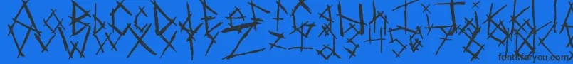 Czcionka ChikenSkratch – czarne czcionki na niebieskim tle