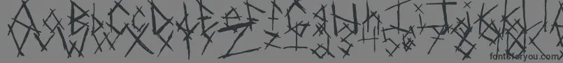 ChikenSkratch-Schriftart – Schwarze Schriften auf grauem Hintergrund