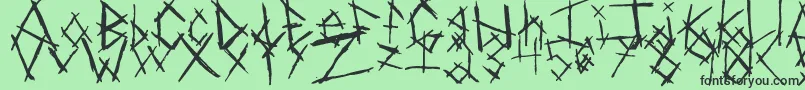 Czcionka ChikenSkratch – czarne czcionki na zielonym tle