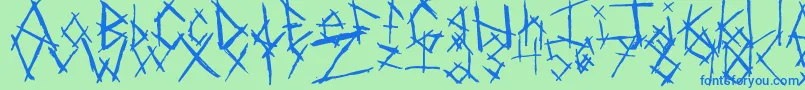 Czcionka ChikenSkratch – niebieskie czcionki na zielonym tle