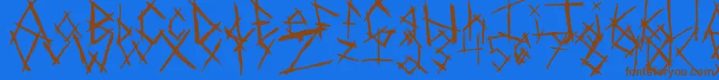 Czcionka ChikenSkratch – brązowe czcionki na niebieskim tle