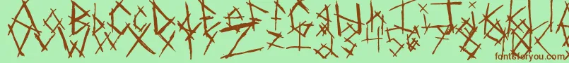 Czcionka ChikenSkratch – brązowe czcionki na zielonym tle