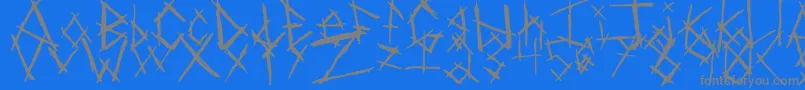 Czcionka ChikenSkratch – szare czcionki na niebieskim tle