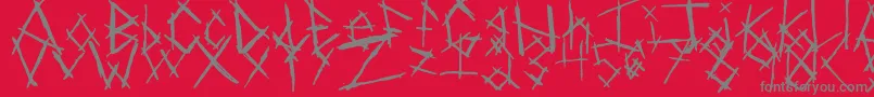 Czcionka ChikenSkratch – szare czcionki na czerwonym tle