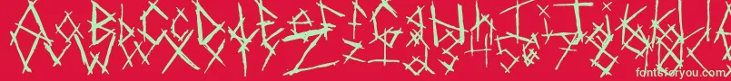 ChikenSkratch-Schriftart – Grüne Schriften auf rotem Hintergrund
