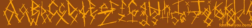 Czcionka ChikenSkratch – pomarańczowe czcionki na brązowym tle