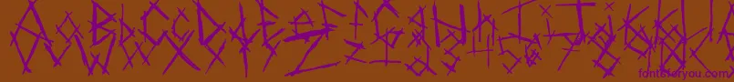 Czcionka ChikenSkratch – fioletowe czcionki na brązowym tle