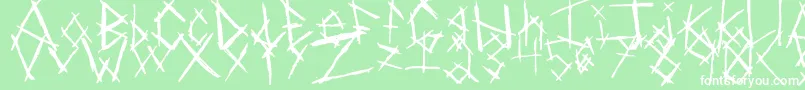 Czcionka ChikenSkratch – białe czcionki na zielonym tle