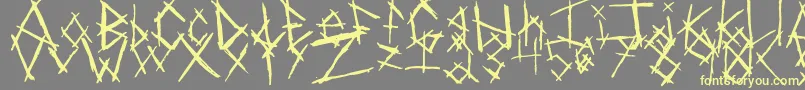 ChikenSkratch-Schriftart – Gelbe Schriften auf grauem Hintergrund