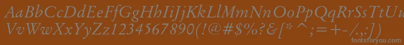 OriginalgaramondcbtItalic-fontti – harmaat kirjasimet ruskealla taustalla