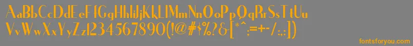 フォントIronicknf – オレンジの文字は灰色の背景にあります。