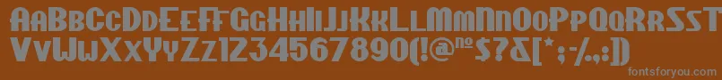 Chippewafallsnf-fontti – harmaat kirjasimet ruskealla taustalla