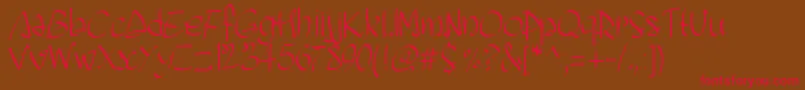 フォントPwscriptease – 赤い文字が茶色の背景にあります。