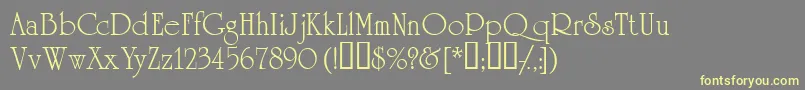 Academiassk Font – Yellow Fonts on Gray Background