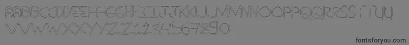 NuevostencilHollow Font – Black Fonts on Gray Background