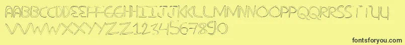 NuevostencilHollow Font – Black Fonts on Yellow Background