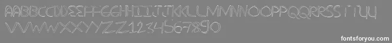 NuevostencilHollow Font – White Fonts on Gray Background