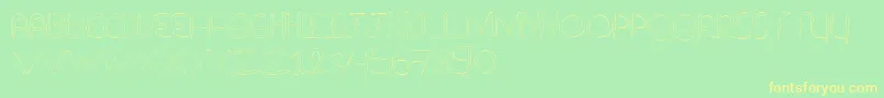 NuevostencilHollow Font – Yellow Fonts on Green Background