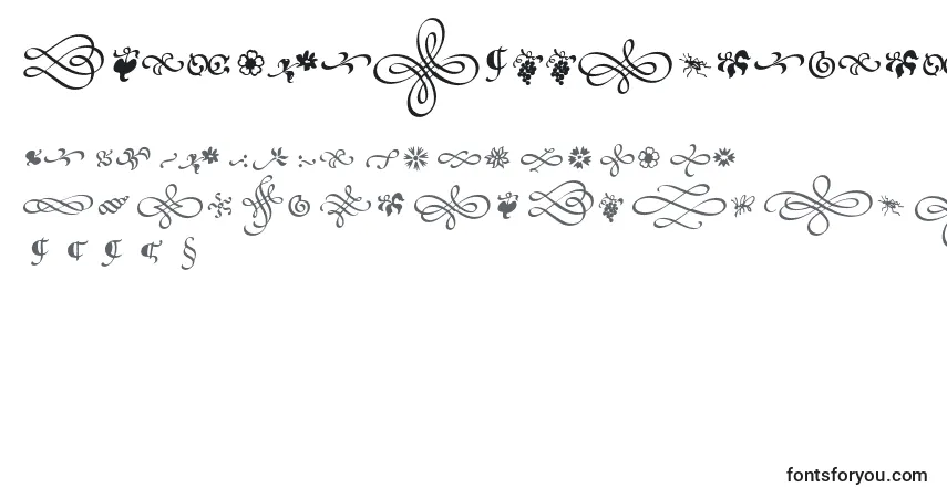 Czcionka PoeticaSuppOrnaments – alfabet, cyfry, specjalne znaki