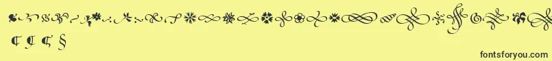 PoeticaSuppOrnaments Font – Black Fonts on Yellow Background